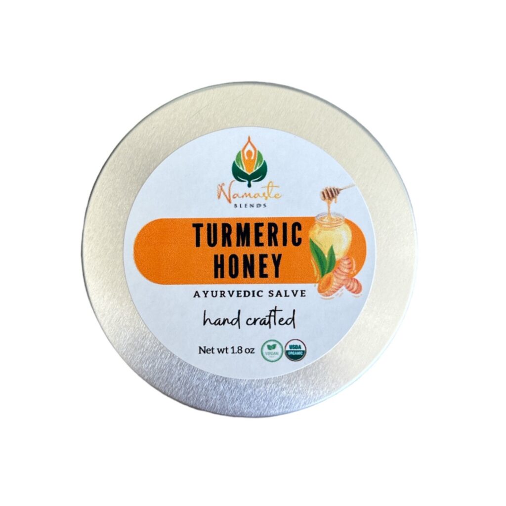 A jar of herbal balm with organic turmeric and honey, surrounded by natural ingredients like beeswax, olive oil, and essential oils, highlighting its nourishing properties. Natural Healing Skin Salve