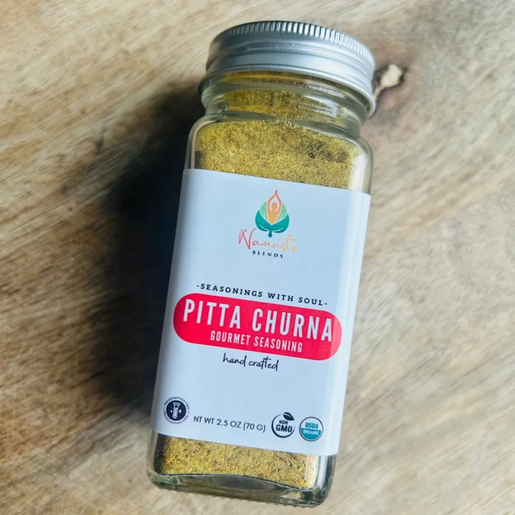 Cooling Pitta Churna: An Ayurvedic spice blend of organic cumin, coriander, and fennel designed to soothe Pitta, aid digestion, and promote wellness.