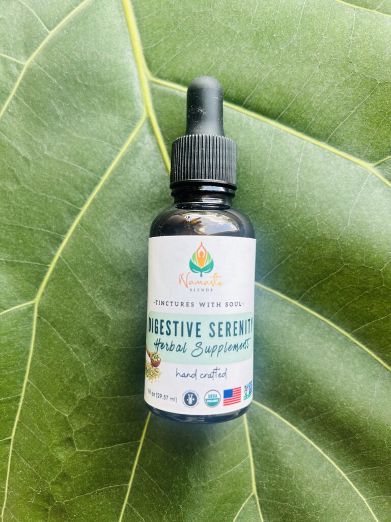 Bottle of Digestive Serenity Herbal Supplement with organic fennel and food-grade alcohol, designed to support digestion, ease bloating, and promote gut wellness.