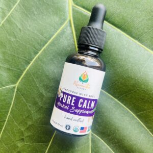 Bottle of Pure Calm Herbal Supplement with calming herbs, designed to support relaxation, reduce stress, and promote emotional balance.