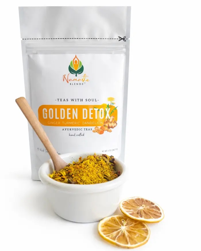 Loose leaf herbal tea for gentle detox displayed in a minimalist setting with a white mug and warm neutral tones, caffeine free herbal tea with visible golden botanicals designed for daily cleansing rituals and balanced wellness routine, natural loose leaf tea blend for mindful living and reset habits, cozy tea aesthetic, herbal tea for digestive support routine, wellness tea gift idea, loose leaf tea pouch presentation for self care and grounding daily rituals