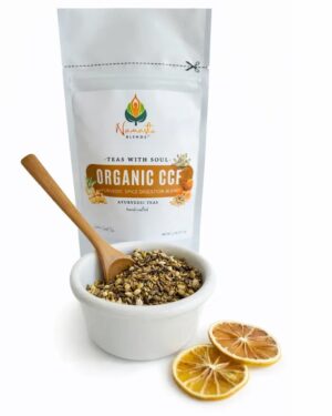 Loose leaf organic CCF tea blend with cumin coriander and fennel displayed in a minimalist setting with a white mug and neutral background, caffeine free herbal tea with visible whole seeds designed for daily digestive wellness rituals, natural loose leaf tea for gentle balance and mindful living, cozy tea aesthetic, traditional Ayurvedic herbal tea blend for everyday routine, wellness tea gift idea, loose leaf tea pouch presentation for grounding self care practice