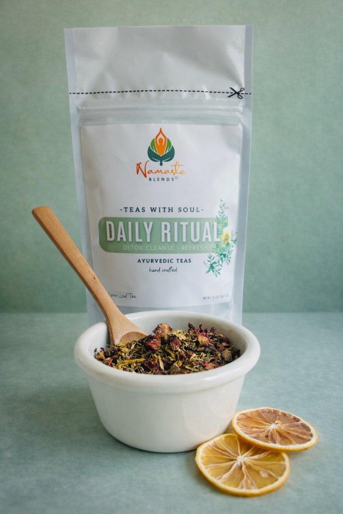 loose leaf herbal tea for daily wellness rituals displayed in a minimalist setting with a white mug and neutral background, caffeine free herbal tea with visible dried botanicals designed for everyday balance and mindful living, natural loose leaf tea blend for daily routine and self care lifestyle, cozy tea aesthetic, herbal tea for grounding habits, wellness tea gift idea, loose leaf tea pouch presentation for intentional and balanced lifestyle