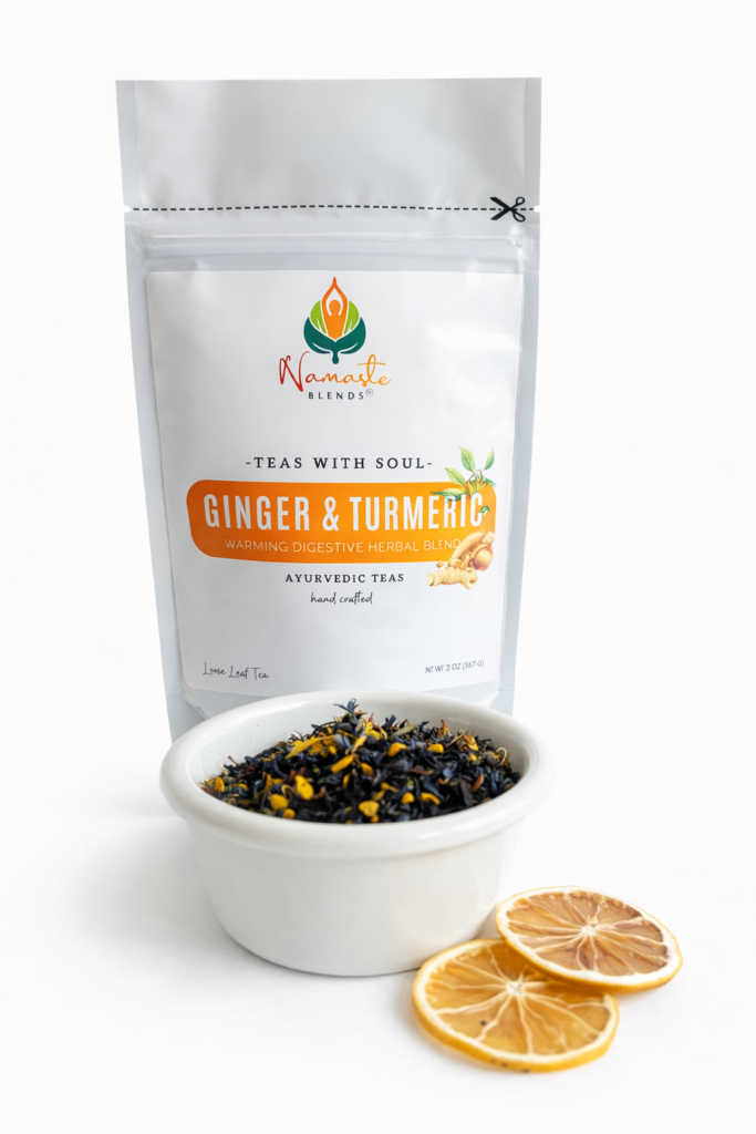 ginger turmeric herbal tea displayed in a minimalist setting with a white mug and warm neutral tones, caffeine free herbal tea with visible ginger pieces and turmeric root, warming botanical blend designed for daily wellness rituals and mindful living, cozy tea aesthetic, herbal tea for comfort and balance routine, wellness tea gift idea, tea presentation for self care and grounding daily habits
