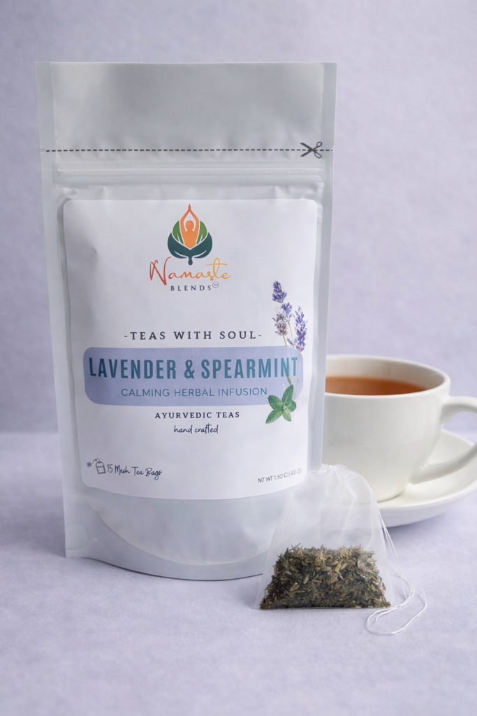 lavender spearmint herbal tea displayed in a minimalist setting with a white mug and soft neutral tones, organic caffeine free herbal tea with visible lavender buds and spearmint leaves, calming floral mint blend designed for daily wellness rituals and mindful living, cozy tea aesthetic, herbal tea for relaxation and balance, wellness tea gift idea, tea presentation for self care and peaceful lifestyle