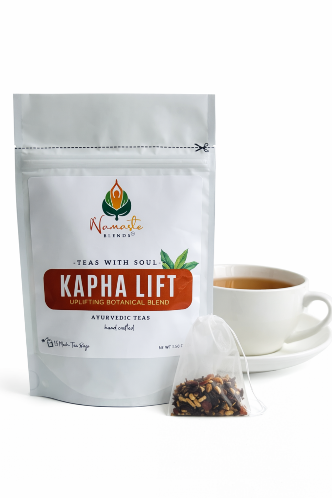 kapha lift herbal tea bags displayed in a minimalist setting with a white mug and warm neutral tones, caffeine free herbal tea sachets with visible spices like ginger clove and citrus pieces, energizing botanical blend designed for daily wellness rituals and mindful living, cozy tea aesthetic, herbal tea for energy and balance routine, wellness tea gift idea, tea bags presentation for self care and uplifting lifestyle