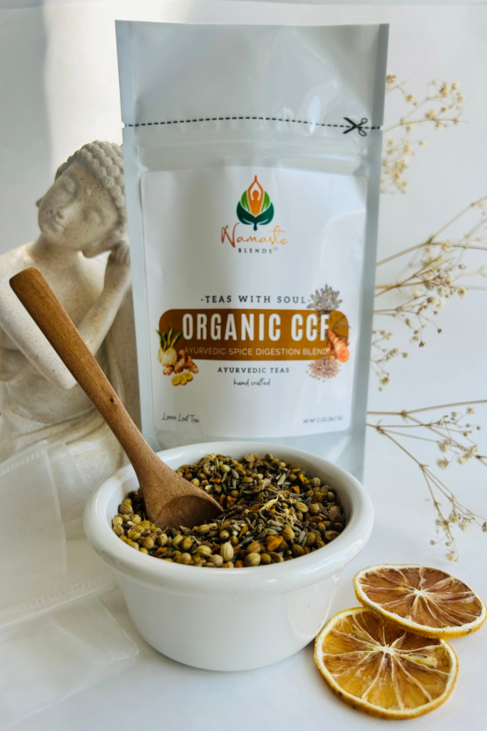 organic ccf herbal tea displayed in a minimalist setting with a white mug and neutral background, caffeine free tea with visible cumin coriander and fennel seeds, traditional ayurvedic herbal blend designed for daily digestive wellness rituals and mindful living, cozy tea aesthetic, natural herbal tea for balance and gentle routine support, wellness tea gift idea, tea presentation for self care and balanced lifestyle
