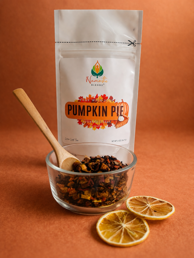 pumpkin pie herbal tea displayed in a minimalist setting with a white mug and warm neutral tones, caffeine free herbal tea with visible spices and pumpkin pieces, cozy spiced tea blend designed for daily wellness rituals and mindful living, fall tea aesthetic, herbal tea for comfort and warmth, wellness tea gift idea, tea presentation for self care and cozy lifestyle
