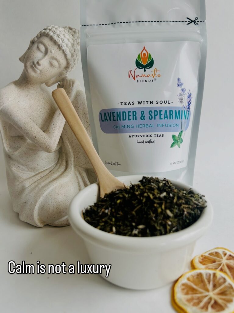 lavender spearmint herbal tea displayed in a minimalist setting with a white mug and soft neutral tones, organic caffeine free herbal tea with visible lavender buds and spearmint leaves, calming floral mint blend designed for daily wellness rituals and mindful living, cozy tea aesthetic, herbal tea for relaxation and balance, wellness tea gift idea, tea presentation for self care and peaceful lifestyle