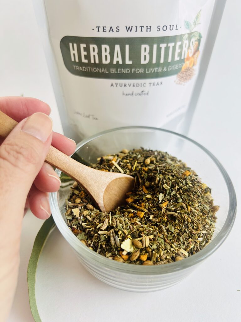 herbal bitters tea displayed in a minimalist setting with a white mug and neutral background, caffeine free herbal tea with visible dried roots and bitter botanicals, natural herbal blend designed for daily digestive wellness rituals and mindful living, cozy tea aesthetic, herbal tea for gut balance and routine support, wellness tea gift idea, tea presentation for self care and balanced lifestyle