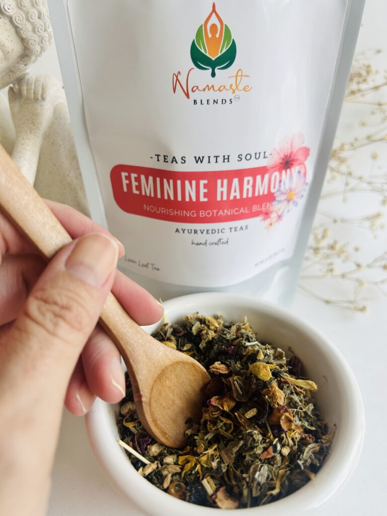 herbal tea bags for feminine balance displayed in a minimalist setting with a white mug and soft neutral tones, caffeine free herbal tea sachets with visible botanicals designed for women’s wellness rituals and mindful living, floral herbal tea for daily self care routine, cozy tea aesthetic, herbal tea for balance and comfort lifestyle, wellness tea gift for women, tea bags presentation for calm and nurturing routine