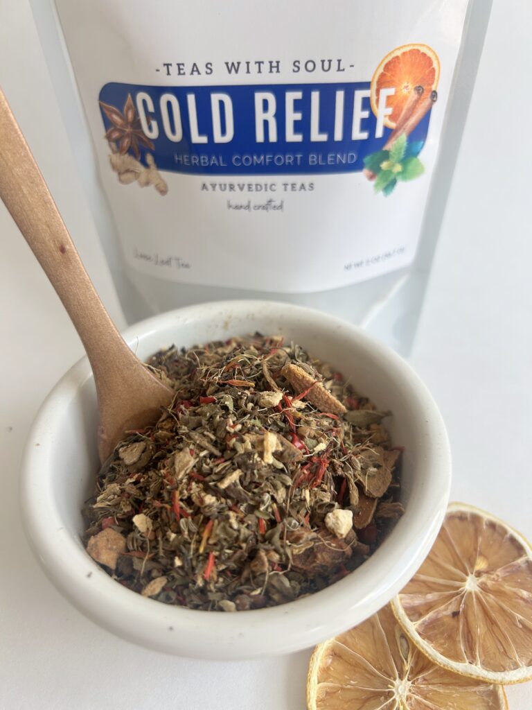 loose leaf herbal tea for cold relief displayed in a minimalist setting with a white mug and neutral background, caffeine free herbal tea with visible dried botanicals designed for soothing daily wellness rituals during seasonal changes, natural loose leaf tea blend for cozy routines and mindful living, warm tea aesthetic, herbal tea for comfort and balance, wellness tea gift idea, loose leaf tea pouch presentation for self care and seasonal lifestyle