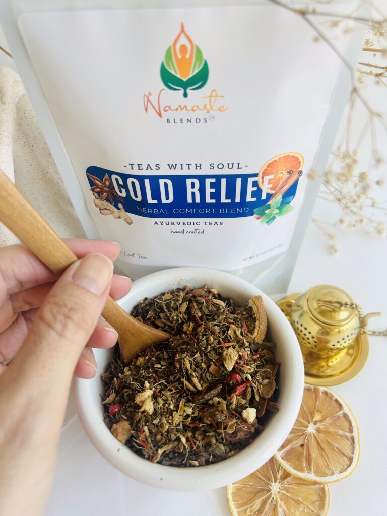 loose leaf herbal tea for cold relief displayed in a minimalist setting with a white mug and neutral background, caffeine free herbal tea with visible dried botanicals designed for soothing daily wellness rituals during seasonal changes, natural loose leaf tea blend for cozy routines and mindful living, warm tea aesthetic, herbal tea for comfort and balance, wellness tea gift idea, loose leaf tea pouch presentation for self care and seasonal lifestyle