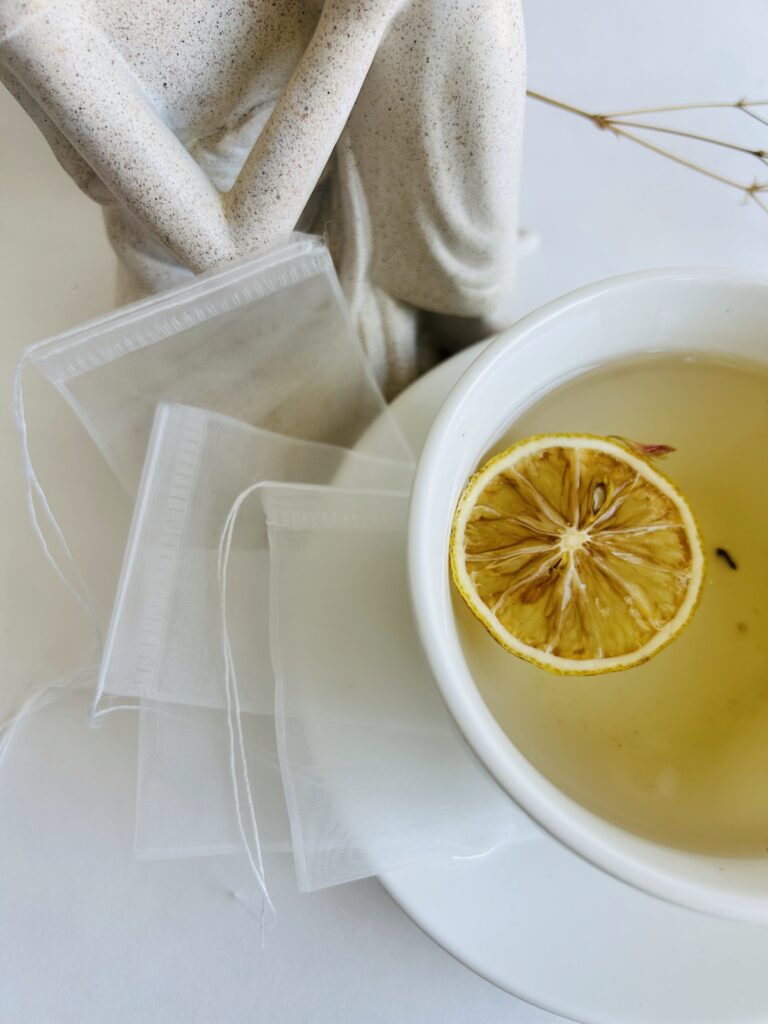 Herbal tea blend loose leaf and tea bags, caffeine free wellness tea, botanical tea for relaxation and daily balance, calming tea ritual, self care tea gift, natural herbal infusion, soothing evening tea, organic style loose leaf tea, cozy tea set, holistic lifestyle tea, small batch handcrafted tea, tea gift for women, relaxing herbal blend, wellness tea for calm, gentle daily tea ritual, premium loose leaf herbs, herbal tea bags for comfort and balance