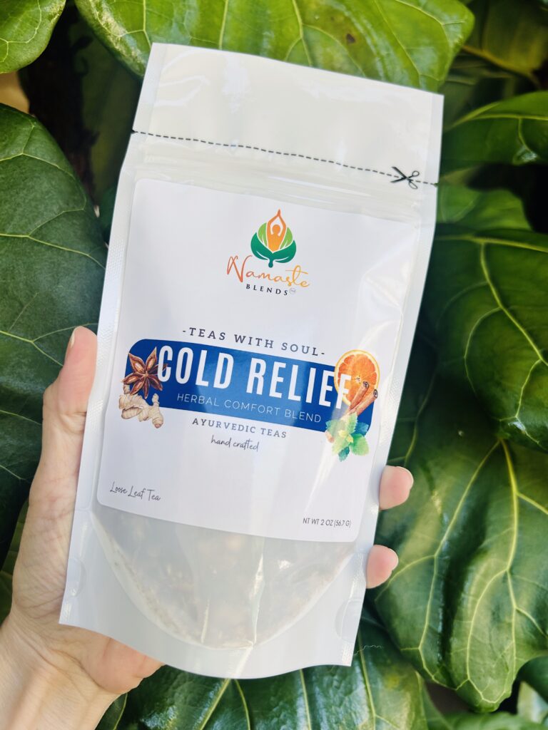 loose leaf herbal tea for cold relief displayed in a minimalist setting with a white mug and neutral background, caffeine free herbal tea with visible dried botanicals designed for soothing daily wellness rituals during seasonal changes, natural loose leaf tea blend for cozy routines and mindful living, warm tea aesthetic, herbal tea for comfort and balance, wellness tea gift idea, loose leaf tea pouch presentation for self care and seasonal lifestyle