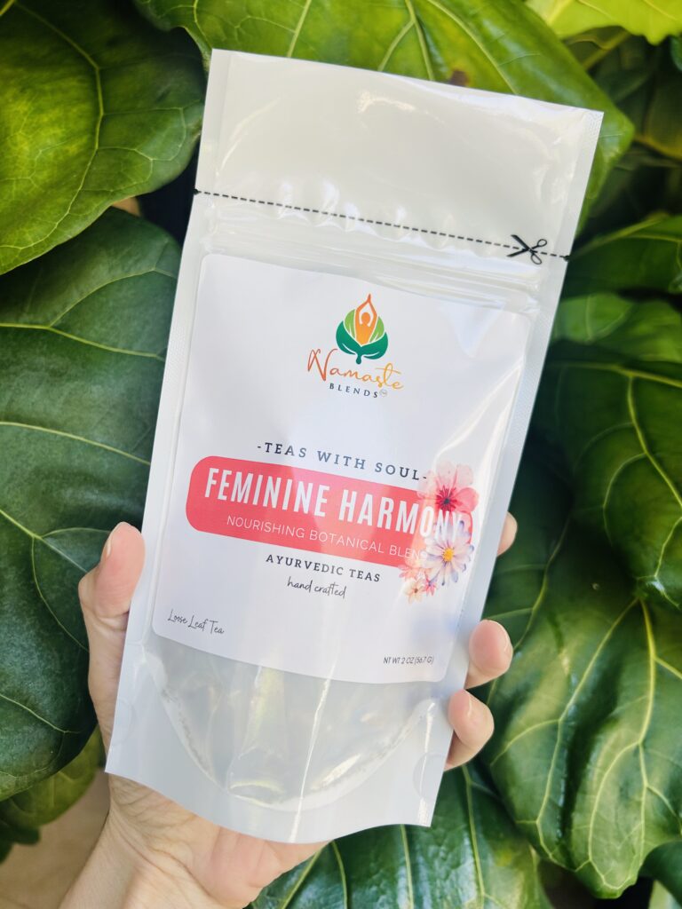 herbal tea bags for feminine balance displayed in a minimalist setting with a white mug and soft neutral tones, caffeine free herbal tea sachets with visible botanicals designed for women’s wellness rituals and mindful living, floral herbal tea for daily self care routine, cozy tea aesthetic, herbal tea for balance and comfort lifestyle, wellness tea gift for women, tea bags presentation for calm and nurturing routine