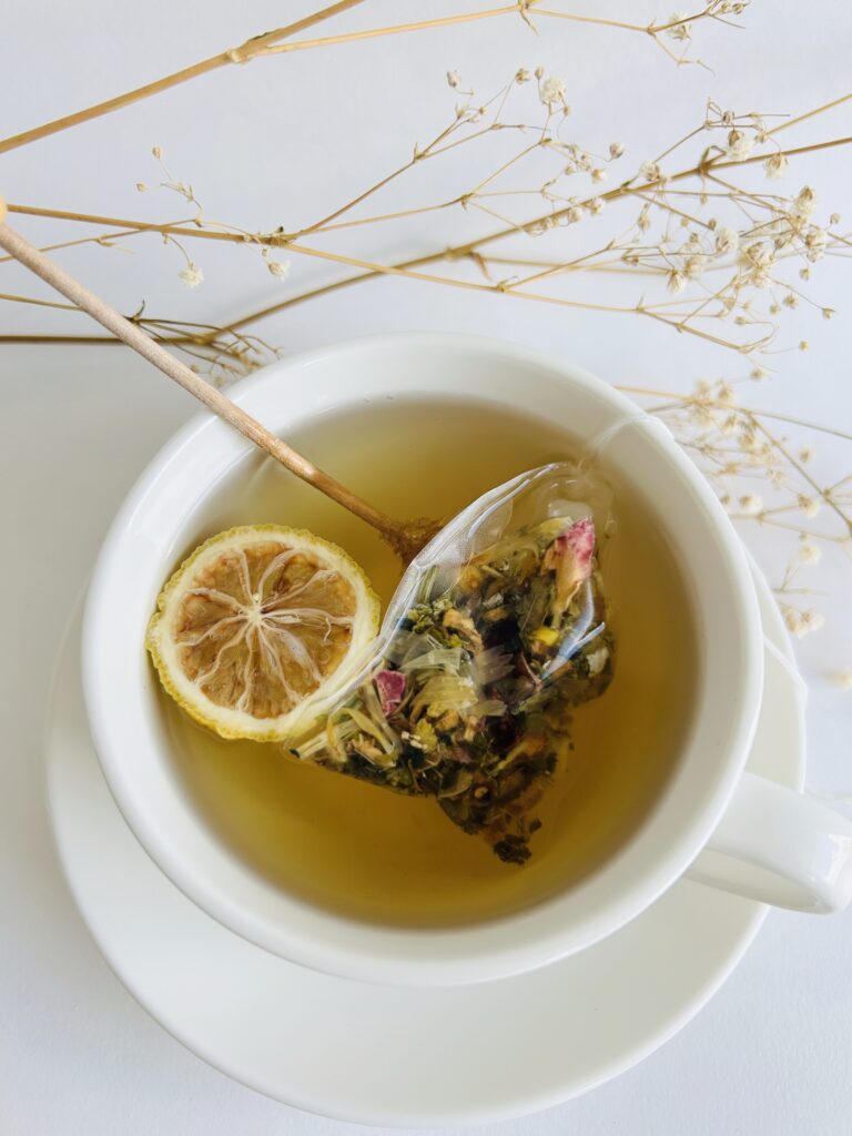 Herbal tea blend loose leaf and tea bags, caffeine free wellness tea, botanical tea for relaxation and daily balance, calming tea ritual, self care tea gift, natural herbal infusion, soothing evening tea, organic style loose leaf tea, cozy tea set, holistic lifestyle tea, small batch handcrafted tea, tea gift for women, relaxing herbal blend, wellness tea for calm, gentle daily tea ritual, premium loose leaf herbs, herbal tea bags for comfort and balance