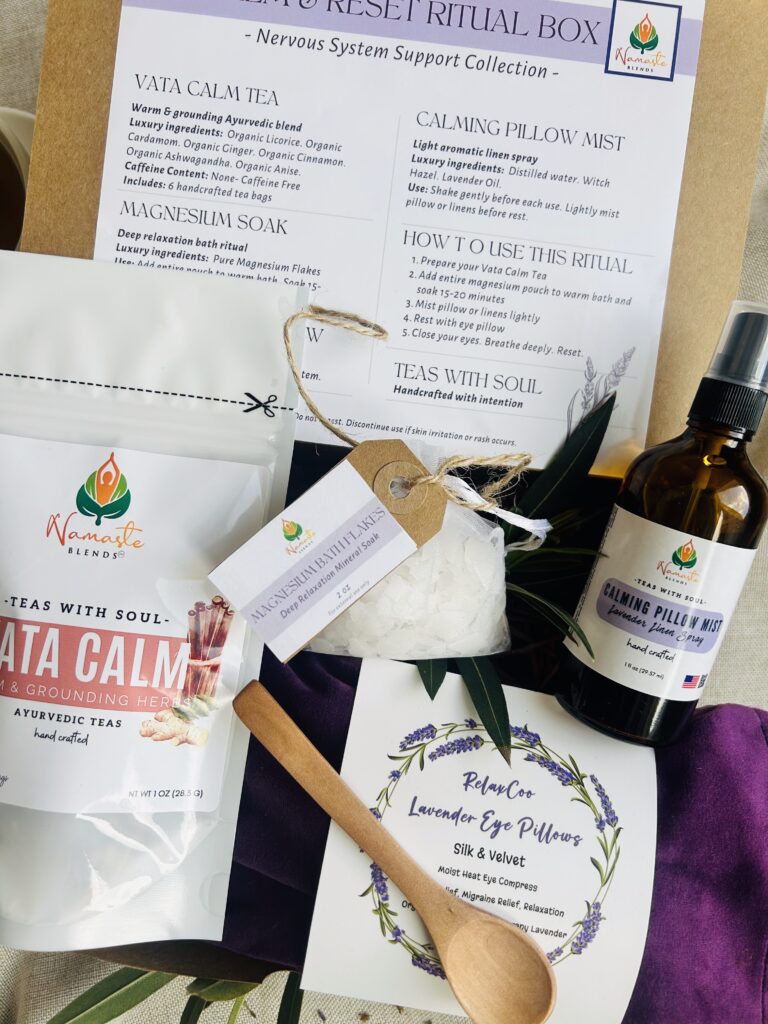 self care gift box displayed in a minimalist setting with a white mug and soft neutral tones, curated wellness set featuring herbal tea bags, lavender eye pillow, pillow mist, magnesium bath flakes and wooden spoon, calming spa gift aesthetic, relaxation gift box for stress relief and mindful living, cozy self care ritual set, wellness gift presentation for comfort and peaceful lifestyle