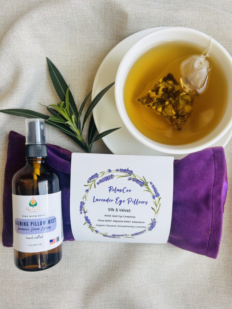 self care gift box displayed in a minimalist setting with a white mug and soft neutral tones, curated wellness set featuring herbal tea bags, lavender eye pillow, pillow mist, magnesium bath flakes and wooden spoon, calming spa gift aesthetic, relaxation gift box for stress relief and mindful living, cozy self care ritual set, wellness gift presentation for comfort and peaceful lifestyle