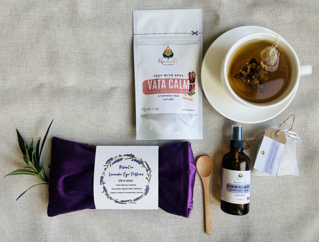 self care gift box displayed in a minimalist setting with a white mug and soft neutral tones, curated wellness set featuring herbal tea bags, lavender eye pillow, pillow mist, magnesium bath flakes and wooden spoon, calming spa gift aesthetic, relaxation gift box for stress relief and mindful living, cozy self care ritual set, wellness gift presentation for comfort and peaceful lifestyle