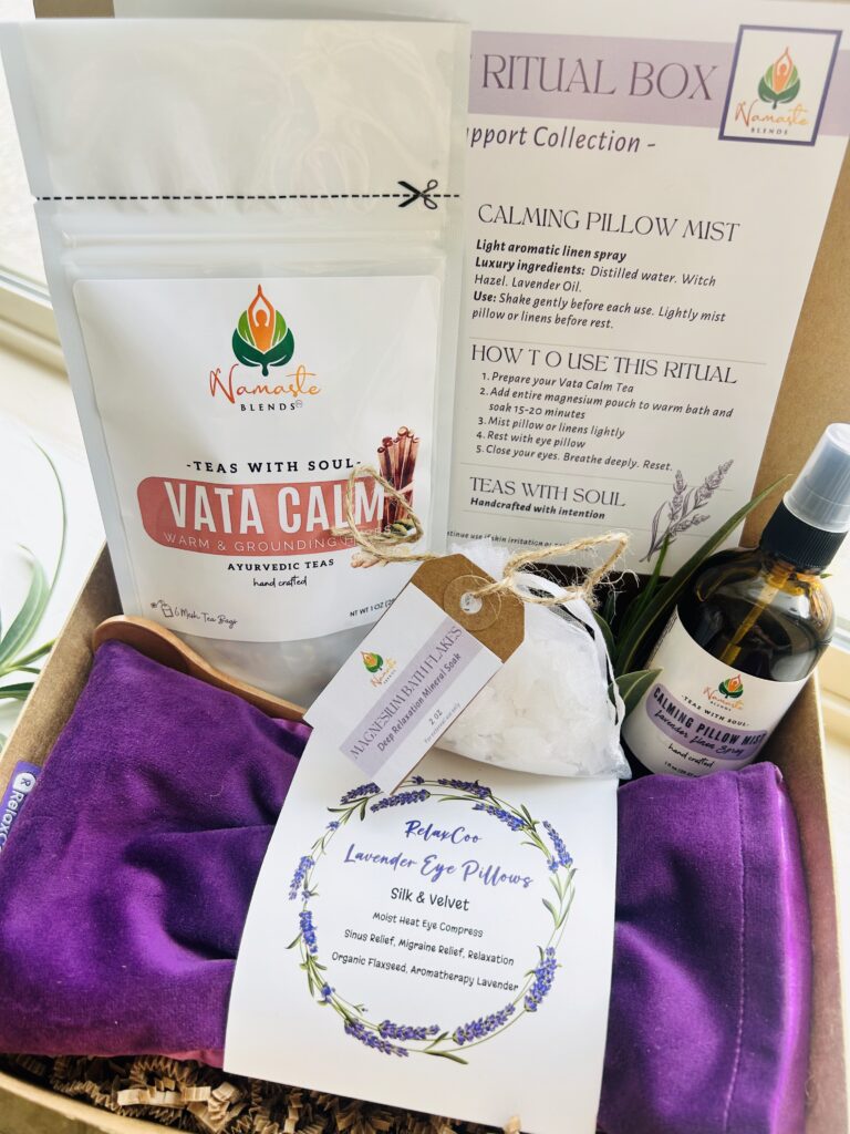 self care gift box displayed in a minimalist setting with a white mug and soft neutral tones, curated wellness set featuring herbal tea bags, lavender eye pillow, pillow mist, magnesium bath flakes and wooden spoon, calming spa gift aesthetic, relaxation gift box for stress relief and mindful living, cozy self care ritual set, wellness gift presentation for comfort and peaceful lifestyle