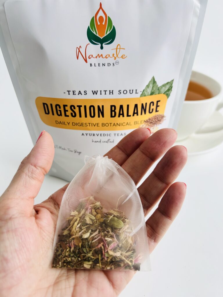 herbal tea bags for digestion balance displayed in a minimalist setting with a white mug and neutral background, caffeine free herbal tea sachets with visible botanicals designed for daily digestive wellness rituals, natural tea bags for after meal routine and mindful living, cozy tea aesthetic, herbal tea for gut balance and gentle support, wellness tea gift idea, tea bags presentation for self care and balanced lifestyle