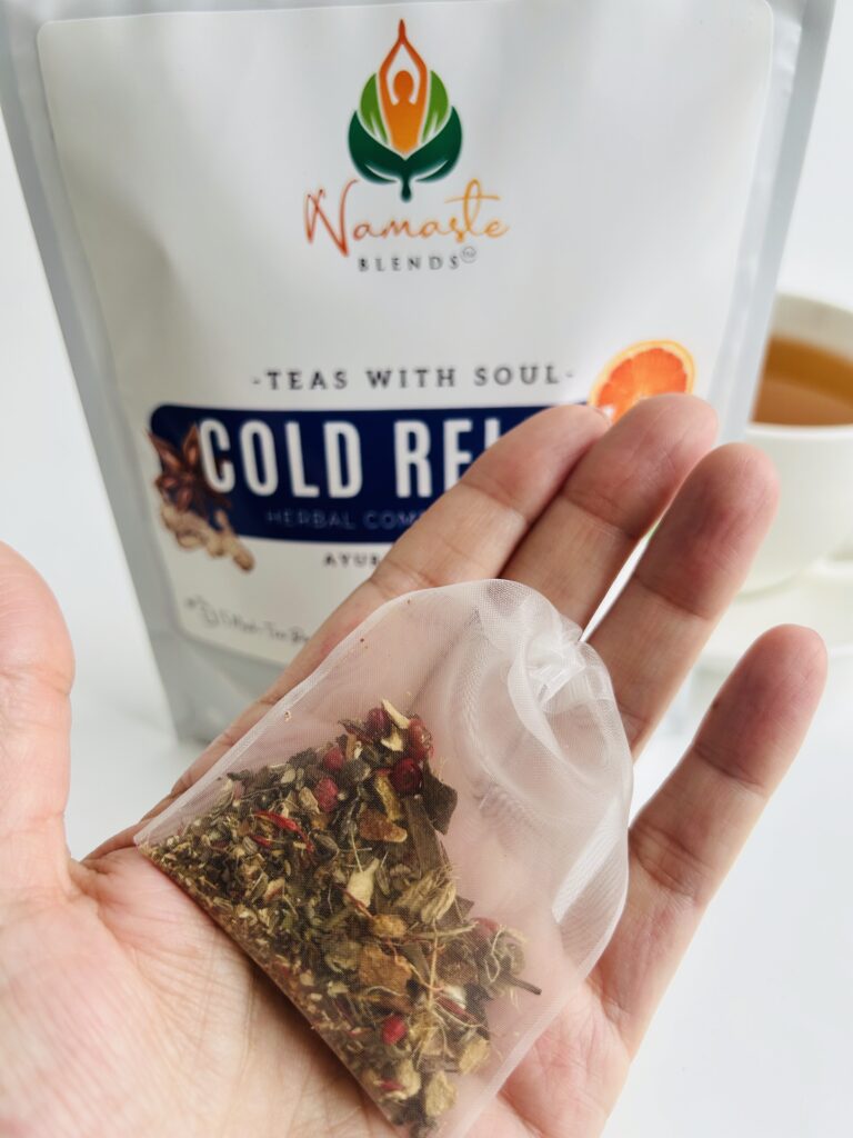 herbal tea bags for cold relief displayed in a minimalist setting with a white mug and neutral background, caffeine free herbal tea sachets with visible botanicals designed for soothing daily wellness rituals during seasonal changes, natural tea bags for cozy routines and mindful living, warm tea aesthetic, herbal tea for comfort and balance, wellness tea gift idea, tea bags presentation for self care and seasonal lifestyle