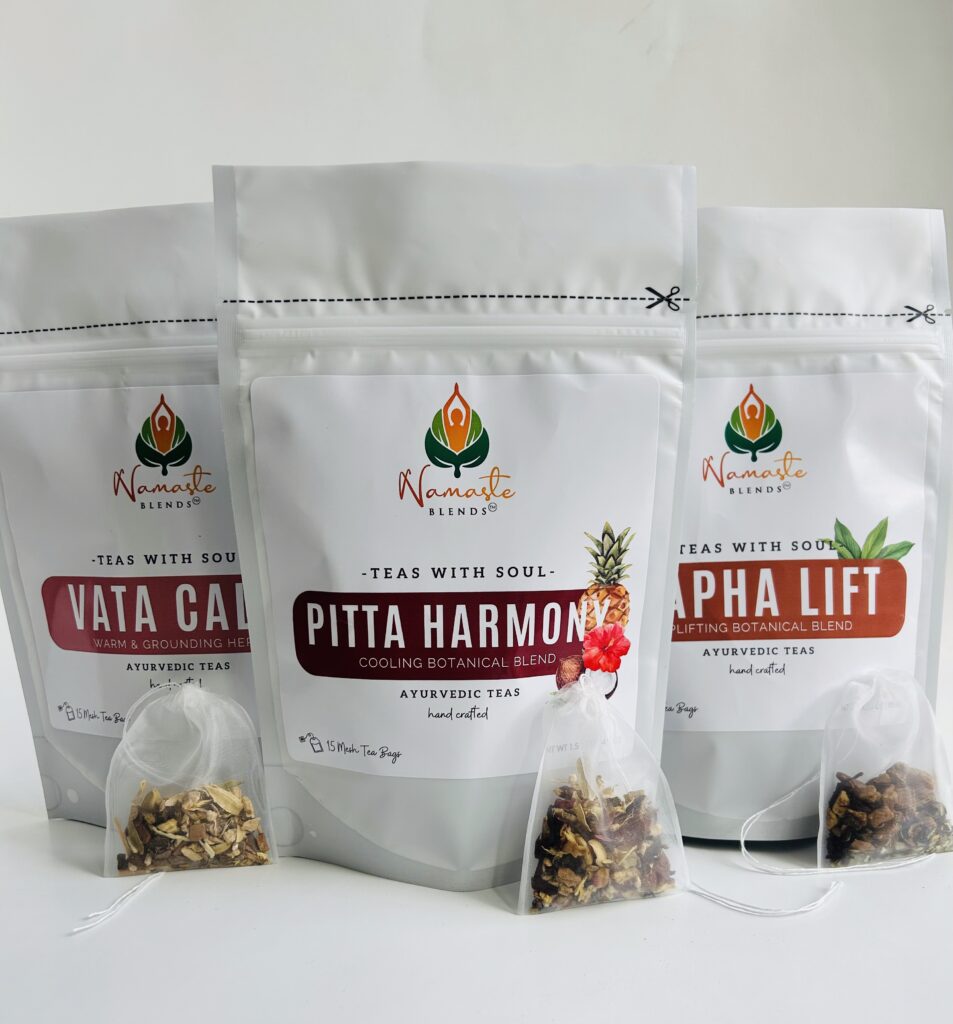 kapha lift herbal tea bags displayed in a minimalist setting with a white mug and warm neutral tones, caffeine free herbal tea sachets with visible spices like ginger clove and citrus pieces, energizing botanical blend designed for daily wellness rituals and mindful living, cozy tea aesthetic, herbal tea for energy and balance routine, wellness tea gift idea, tea bags presentation for self care and uplifting lifestyle