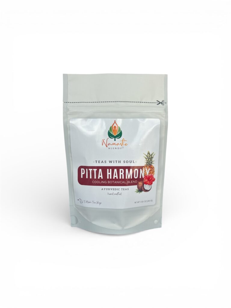 pitta harmony herbal tea bags displayed in a minimalist setting with a white mug and soft neutral tones, caffeine free herbal tea sachets with visible floral botanicals like hibiscus and rose, cooling herbal blend designed for daily wellness rituals and mindful living, cozy tea aesthetic, herbal tea for calm and balance, wellness tea gift idea, tea bags presentation for self care and refreshing routine