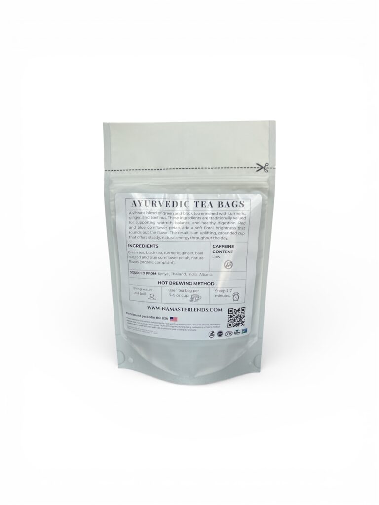ginger turmeric herbal tea displayed in a minimalist setting with a white mug and warm neutral tones, caffeine free herbal tea with visible ginger pieces and turmeric root, warming botanical blend designed for daily wellness rituals and mindful living, cozy tea aesthetic, herbal tea for comfort and balance routine, wellness tea gift idea, tea presentation for self care and grounding daily habits