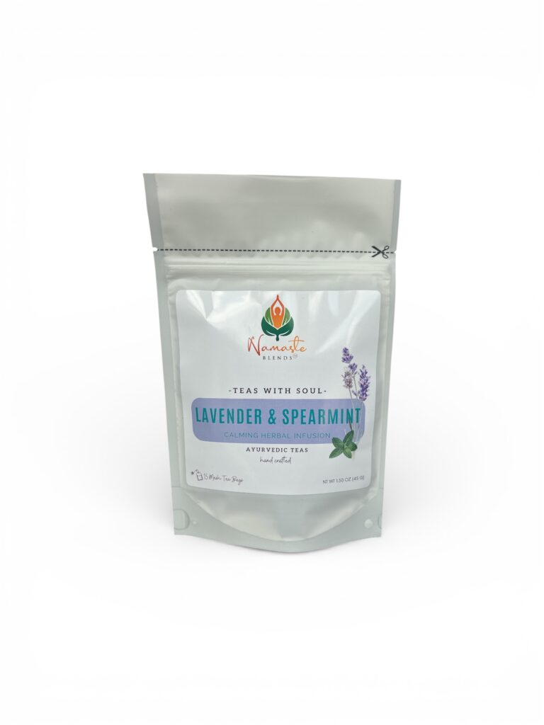 lavender spearmint herbal tea displayed in a minimalist setting with a white mug and soft neutral tones, organic caffeine free herbal tea with visible lavender buds and spearmint leaves, calming floral mint blend designed for daily wellness rituals and mindful living, cozy tea aesthetic, herbal tea for relaxation and balance, wellness tea gift idea, tea presentation for self care and peaceful lifestyle