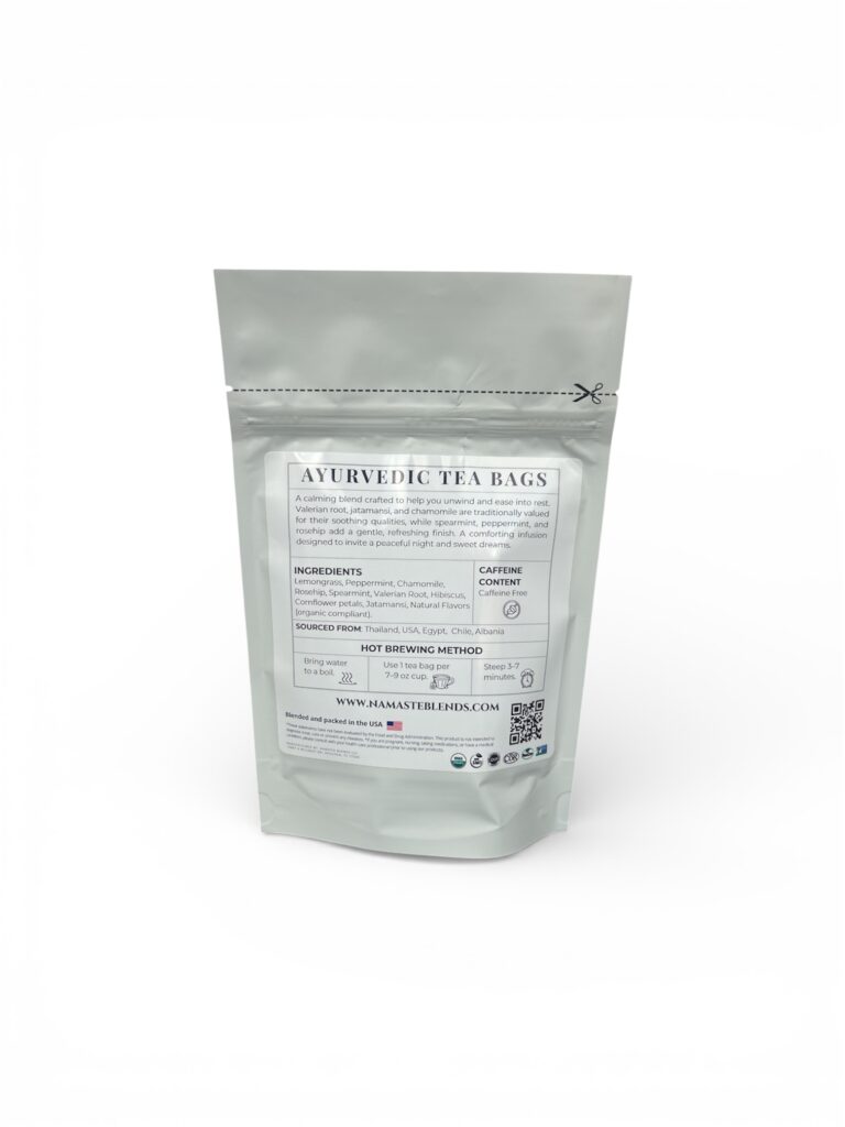 sweet dreams herbal tea bags displayed in a minimalist setting with a white mug and soft neutral tones, caffeine free herbal tea sachets with visible botanicals like chamomile and lemongrass, calming night blend designed for evening wellness rituals and mindful living, cozy tea aesthetic, herbal tea for relaxation and rest routine, wellness tea gift idea, tea bags presentation for self care and peaceful lifestyle