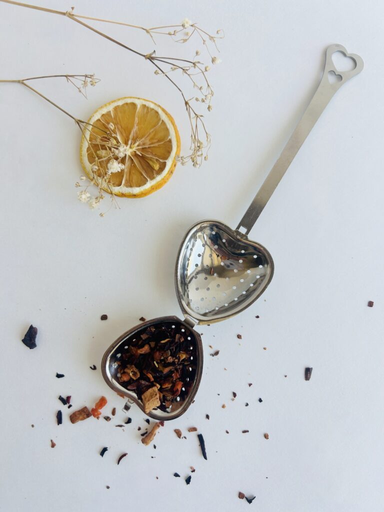 heart tea infuser stainless steel loose leaf tea strainer reusable tea tool cute tea accessory for mug loose leaf brewing cozy tea ritual tea lover gift simple tea accessory small tea strainer durable metal infuser aesthetic tea tool minimalist tea setup warm tea moment daily tea ritual accessory