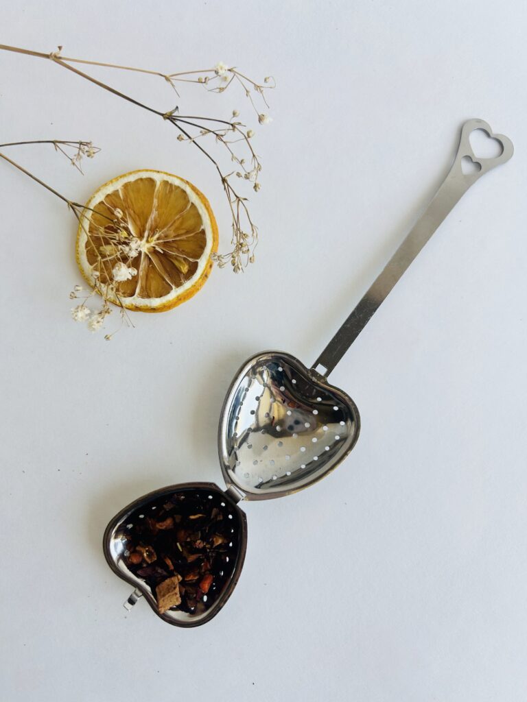 heart tea infuser stainless steel loose leaf tea strainer reusable tea tool cute tea accessory for mug loose leaf brewing cozy tea ritual tea lover gift simple tea accessory small tea strainer durable metal infuser aesthetic tea tool minimalist tea setup warm tea moment daily tea ritual accessory