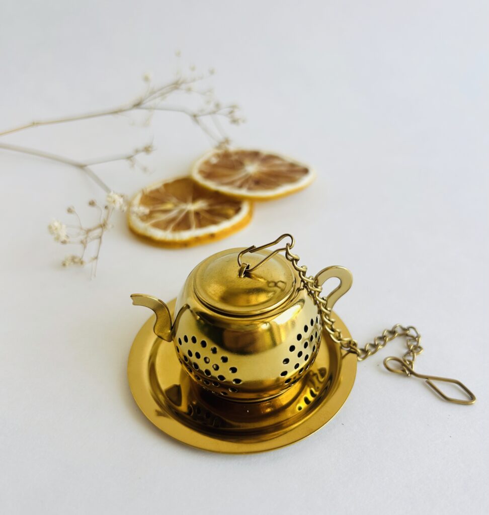 tea cup infuser stainless steel tea strainer for loose leaf tea reusable tea infuser for mug easy tea brewing tool fine mesh tea infuser for herbs tea accessory for tea lovers daily tea ritual tool simple tea setup minimalist tea accessory hot tea brewing infuser