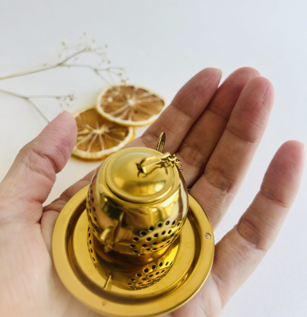 tea cup infuser stainless steel tea strainer for loose leaf tea reusable tea infuser for mug easy tea brewing tool fine mesh tea infuser for herbs tea accessory for tea lovers daily tea ritual tool simple tea setup minimalist tea accessory hot tea brewing infuser