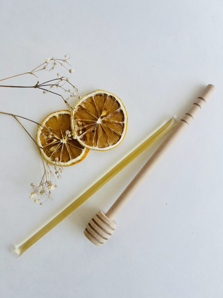 wooden honey dipper natural honey spoon tea accessory for loose leaf tea honey drizzle tool eco friendly wooden utensil tea ritual accessory small kitchen tool for tea lovers cozy tea setup minimalist tea accessory reusable honey dipper for tea warm tea moment natural wood tea tool