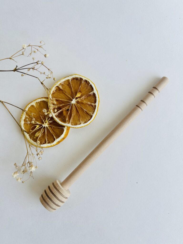 wooden honey dipper natural honey spoon tea accessory for loose leaf tea honey drizzle tool eco friendly wooden utensil tea ritual accessory small kitchen tool for tea lovers cozy tea setup minimalist tea accessory reusable honey dipper for tea warm tea moment natural wood tea tool
