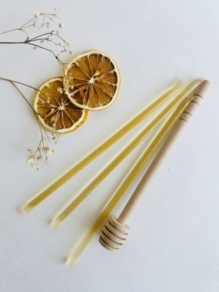 wooden honey dipper natural honey spoon tea accessory for loose leaf tea honey drizzle tool eco friendly wooden utensil tea ritual accessory small kitchen tool for tea lovers cozy tea setup minimalist tea accessory reusable honey dipper for tea warm tea moment natural wood tea tool