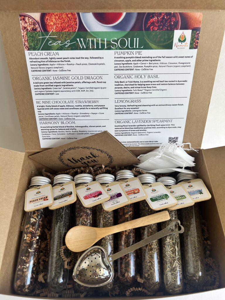Loose leaf herbal tea gift box displayed in a minimalist setting with a white mug and neutral background, curated wellness set featuring loose leaf tea blends with visible botanicals, tea essentials such as honey sticks and dried citrus slices, cozy tea ritual aesthetic, tea gift box for self care and mindful living, premium loose leaf tea set presentation for gifting and balanced lifestyle