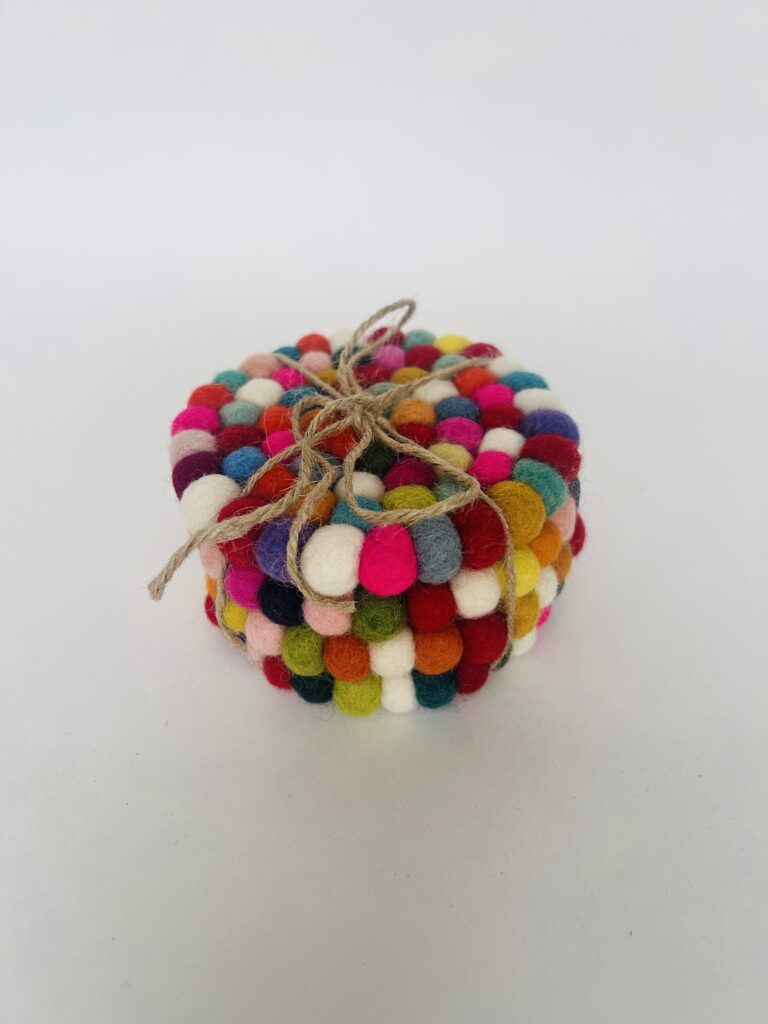 floral felt ball coasters soft pom pom coasters set of 4 colorful flower coaster set tea cup coaster cozy tea setup table decor tea accessory soft coaster set for mugs handmade style coaster aesthetic tea ritual decor home decor tea lovers gift soft felt coaster set