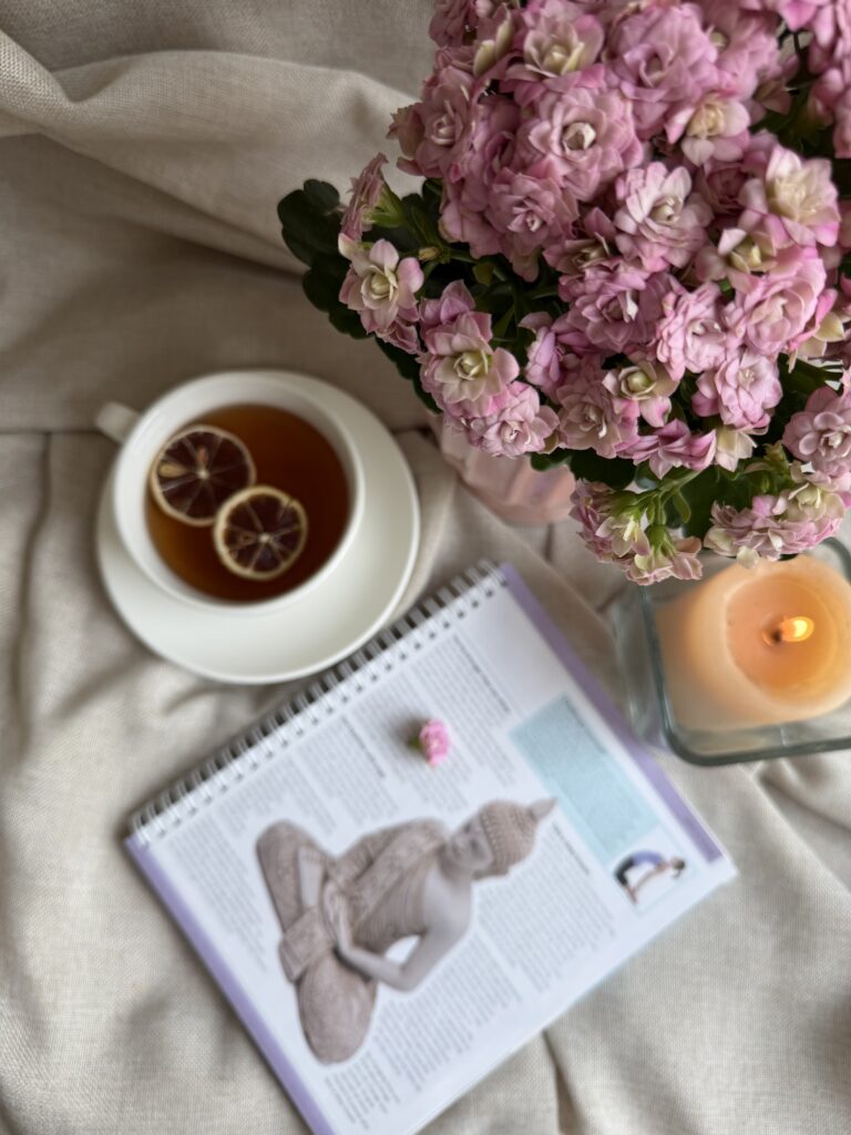 Botanical Reset Gift Box featuring Daily Ritual Herbal Tea, cozy blanket, eye mask, magnesium bath flakes, pillow mist, honey stick, ceramic tea cup, and wellness accessories by Namaste Blends.