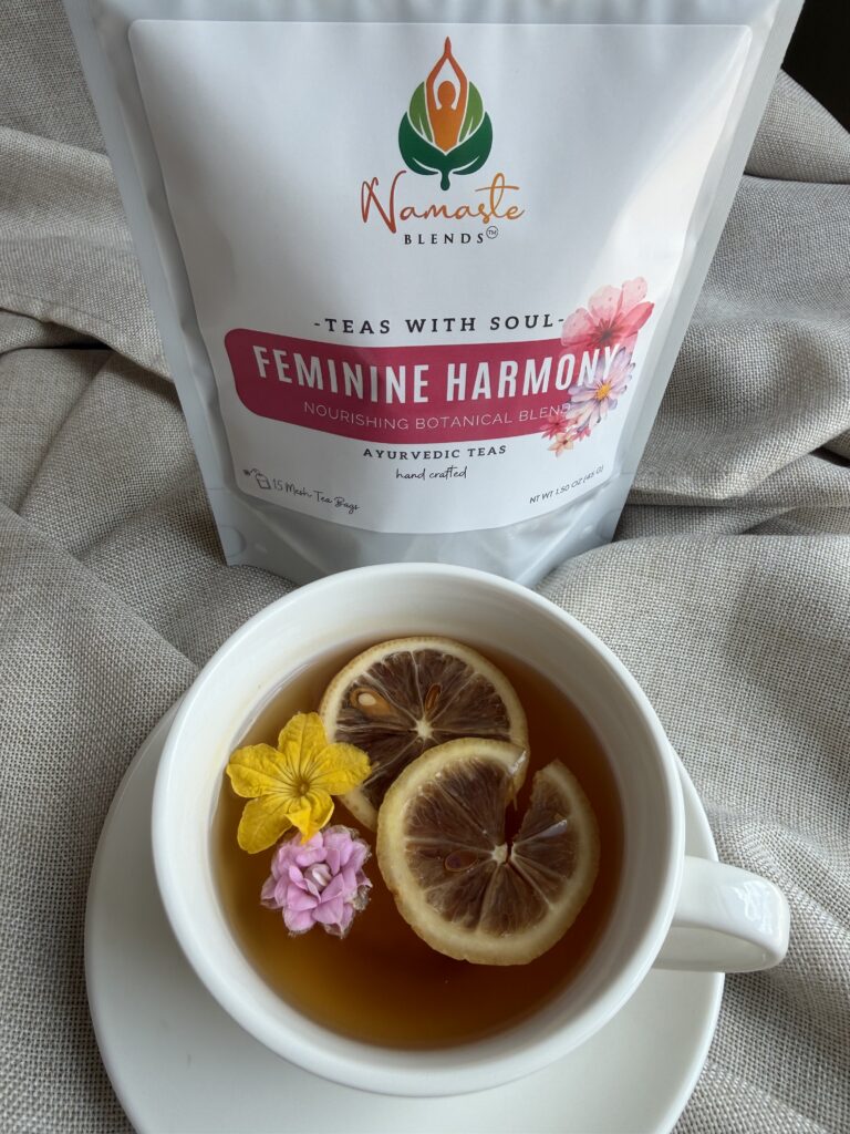 The Bloom Ritual Gift Box is a luxurious self-care gift designed to inspire peaceful moments of relaxation and everyday wellness. Featuring our handcrafted Feminine Harmony Herbal Tea, a cozy throw blanket, plush eye mask, satin scrunchie, magnesium bath flakes, Bloom pillow mist, ceramic tea mug, gold spoon, honey stick, and sugar stick, this beautifully curated collection transforms an ordinary tea break into a comforting self-care ritual. This premium gift set includes 15 food-grade mesh tea bags filled with our naturally caffeine-free botanical blend, handcrafted in small batches by Namaste Blends. Beautifully packaged and ready to gift, it's the perfect choice for birthdays, Mother's Day, Valentine's Day, bridal showers, holidays, or anyone who enjoys cozy tea moments, botanical wellness, and intentional self-care.