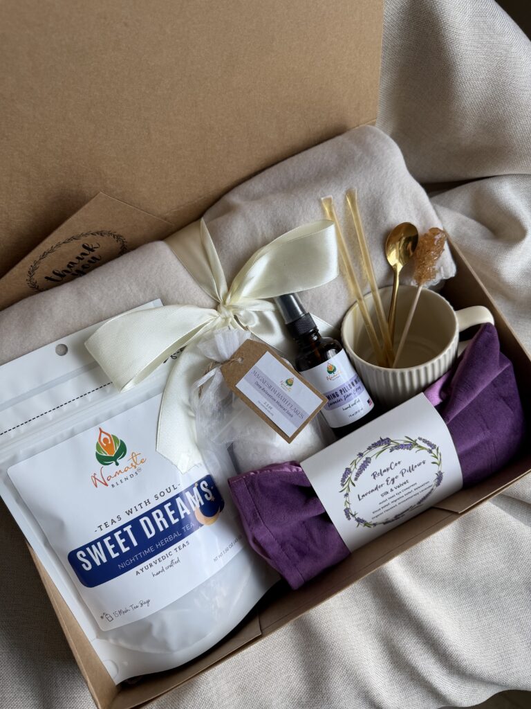 The Sweet Dreams Ritual Box is a luxurious bedtime gift designed to inspire peaceful evenings and comforting self-care rituals. Featuring our handcrafted Sweet Dreams Herbal Tea, a soft throw blanket, lavender eye pillow, magnesium bath flakes, calming pillow mist, ceramic tea mug, gold spoon, honey stick, and sugar stick, this beautifully curated collection creates the perfect nighttime tea experience. This premium gift set includes 15 food-grade mesh tea bags filled with our naturally caffeine-free botanical blend, handcrafted in small batches by Namaste Blends. Beautifully packaged and ready to gift, it's the perfect choice for birthdays, Mother's Day, holidays, thank-you gifts, or anyone who enjoys cozy evenings, botanical teas, and intentional bedtime rituals.